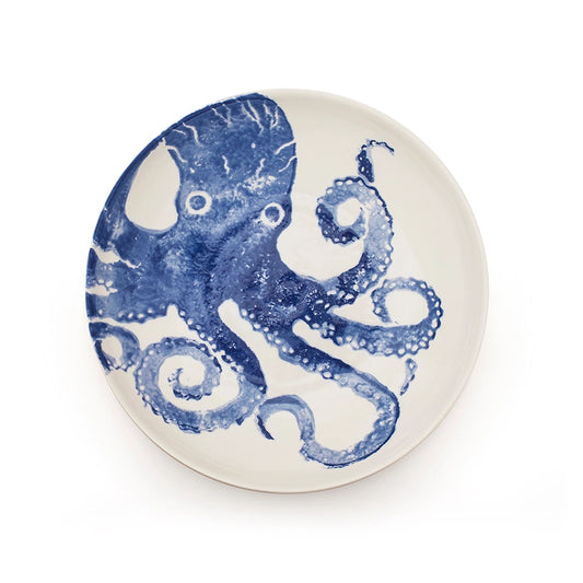 The octopus has inspired the artwork on this ceramic supper bowl, where a hand-sponging technique of glaze application has captured the creature’s texture. blue with a white background