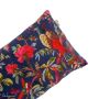 A velvet cushion with a colourful design depicting exotic birds and botanical scene on the front and back. The background is a dark luxurious blue and this is a great accent piece for a bedroom or living room.