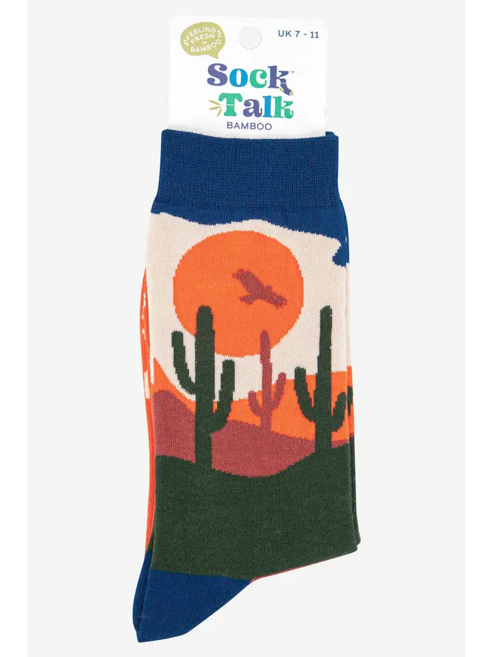 Men's Wild West themed desert landscape. These bamboo socks feature a warm sunset, a cactus and soaring eagle.