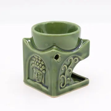 This oil burner with Buddha motif is ideal for burning your essential oils or wax melts. made from high quality ceramic and finished with a high gloss dark jade glaze. Measurements: 38cm x 38cm