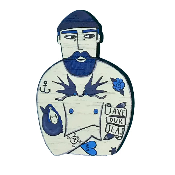 brooch of tatooed sailor wooden with pin white and blue