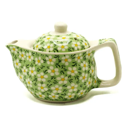 Small teapot with green mosaic pattern. Comes with tea leaf strainer. Can be complimented with cups from the same collection.

Ceramic