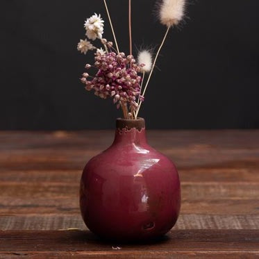 Ceramic bud vases in pink with a distressed glaze finish which gives the vase a vintage look, Also available in a range of muted tones.