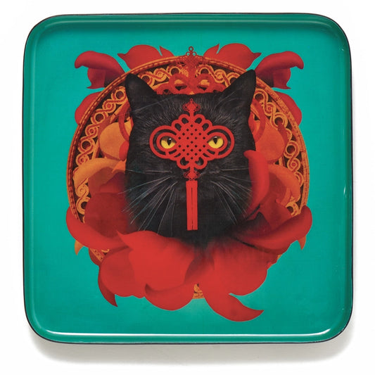 Green square trinket tray with central design of black cat with red embellishment