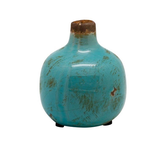 As a small ceramic bud vase in&nbsp; turquoise, this vase is perfect for displaying a single stem or adding a pop of color in a group setting. From its versatile use to its aesthetically pleasing appearance, this vase is sure to enhance any space.