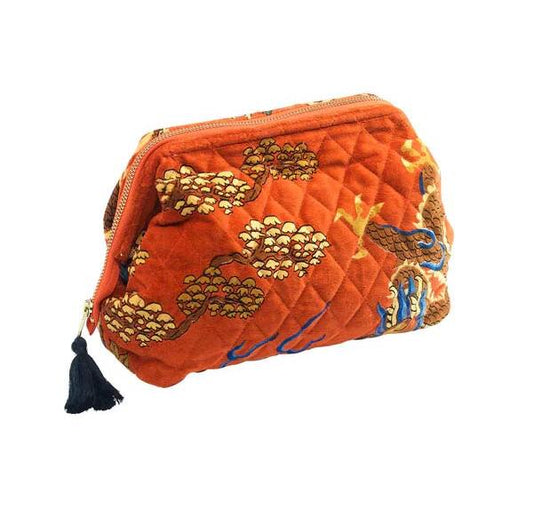 A velvet cosmetic bag with a classic chinese dragon motif